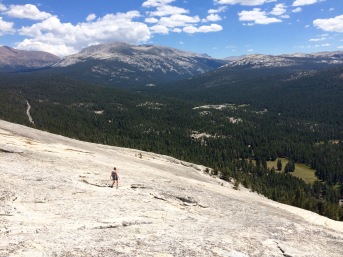View of hiker atop the Lembert Dome