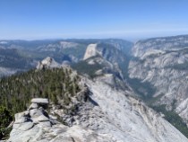 The trail then continues southwest over the summit of Clouds Rest and down towards Half Dome and the Quarter Domes